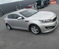 Серый Киа K5, объемом двигателя 2 л и пробегом 350 тыс. км за 6999 $, фото 1 на Automoto.ua