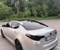 Серый Киа K5, объемом двигателя 2 л и пробегом 325 тыс. км за 9300 $, фото 9 на Automoto.ua
