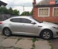 Серый Киа K5, объемом двигателя 2 л и пробегом 220 тыс. км за 9500 $, фото 4 на Automoto.ua