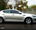 Серый Киа K5, объемом двигателя 2 л и пробегом 170 тыс. км за 10000 $, фото 2 на Automoto.ua