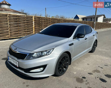Серый Киа K5, объемом двигателя 2 л и пробегом 248 тыс. км за 9500 $, фото 6 на Automoto.ua