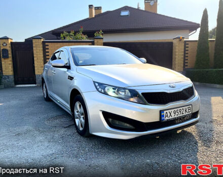 Серый Киа K5, объемом двигателя 2 л и пробегом 415 тыс. км за 7100 $, фото 1 на Automoto.ua