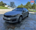 Серый Киа K5, объемом двигателя 2 л и пробегом 265 тыс. км за 10800 $, фото 1 на Automoto.ua
