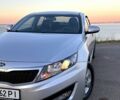 Серый Киа K5, объемом двигателя 2 л и пробегом 275 тыс. км за 7000 $, фото 1 на Automoto.ua