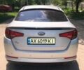 Серый Киа K5, объемом двигателя 2 л и пробегом 420 тыс. км за 7000 $, фото 3 на Automoto.ua