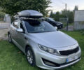 Серый Киа K5, объемом двигателя 2 л и пробегом 285 тыс. км за 8000 $, фото 1 на Automoto.ua