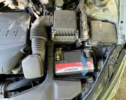 Серый Киа K5, объемом двигателя 2 л и пробегом 244 тыс. км за 7200 $, фото 5 на Automoto.ua