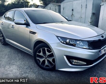 Серый Киа K5, объемом двигателя 2 л и пробегом 245 тыс. км за 7999 $, фото 3 на Automoto.ua