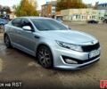 Серый Киа K5, объемом двигателя 2 л и пробегом 246 тыс. км за 8700 $, фото 1 на Automoto.ua