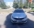 Серый Киа K5, объемом двигателя 2 л и пробегом 584 тыс. км за 8000 $, фото 1 на Automoto.ua