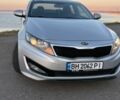 Серый Киа K5, объемом двигателя 2 л и пробегом 275 тыс. км за 8200 $, фото 1 на Automoto.ua