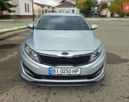 Серый Киа K5, объемом двигателя 2 л и пробегом 249 тыс. км за 8700 $, фото 2 на Automoto.ua