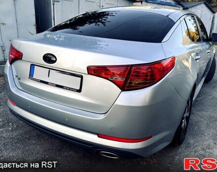 Серый Киа K5, объемом двигателя 2 л и пробегом 245 тыс. км за 7999 $, фото 2 на Automoto.ua