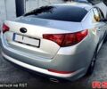 Серый Киа K5, объемом двигателя 2 л и пробегом 245 тыс. км за 7999 $, фото 2 на Automoto.ua