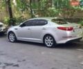 Серый Киа K5, объемом двигателя 2 л и пробегом 190 тыс. км за 8500 $, фото 1 на Automoto.ua