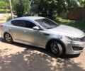 Серый Киа K5, объемом двигателя 2 л и пробегом 420 тыс. км за 7000 $, фото 2 на Automoto.ua