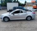 Серый Киа K5, объемом двигателя 2 л и пробегом 350 тыс. км за 3000 $, фото 1 на Automoto.ua