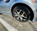 Серый Киа K5, объемом двигателя 2 л и пробегом 244 тыс. км за 7200 $, фото 6 на Automoto.ua