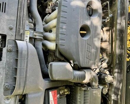 Серый Киа K5, объемом двигателя 2 л и пробегом 244 тыс. км за 7200 $, фото 2 на Automoto.ua