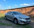 Серый Киа K5, объемом двигателя 2 л и пробегом 199 тыс. км за 8500 $, фото 1 на Automoto.ua