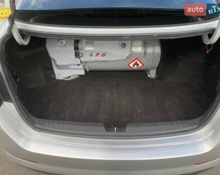 Серый Киа K5, объемом двигателя 2 л и пробегом 401 тыс. км за 7100 $, фото 6 на Automoto.ua