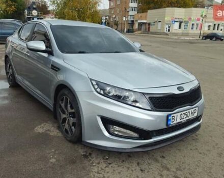 Серый Киа K5, объемом двигателя 2 л и пробегом 249 тыс. км за 8700 $, фото 8 на Automoto.ua