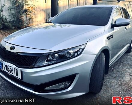 Серый Киа K5, объемом двигателя 2 л и пробегом 245 тыс. км за 7999 $, фото 1 на Automoto.ua