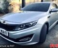 Серый Киа K5, объемом двигателя 2 л и пробегом 245 тыс. км за 7999 $, фото 1 на Automoto.ua