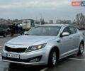 Серый Киа K5, объемом двигателя 2 л и пробегом 498 тыс. км за 6900 $, фото 1 на Automoto.ua