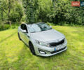 Серый Киа K5, объемом двигателя 2 л и пробегом 440 тыс. км за 8500 $, фото 1 на Automoto.ua