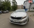 Серый Киа K5, объемом двигателя 2 л и пробегом 170 тыс. км за 9800 $, фото 1 на Automoto.ua
