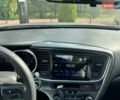Серый Киа K5, объемом двигателя 2 л и пробегом 244 тыс. км за 7200 $, фото 16 на Automoto.ua