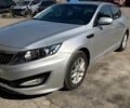 Серый Киа K5, объемом двигателя 2 л и пробегом 250 тыс. км за 6500 $, фото 1 на Automoto.ua