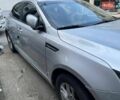 Серый Киа K5, объемом двигателя 2 л и пробегом 230 тыс. км за 7500 $, фото 1 на Automoto.ua