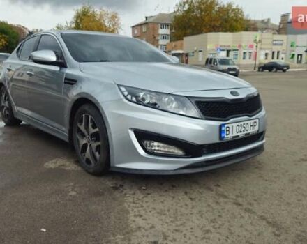 Серый Киа K5, объемом двигателя 2 л и пробегом 249 тыс. км за 8700 $, фото 1 на Automoto.ua
