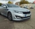 Серый Киа K5, объемом двигателя 2 л и пробегом 249 тыс. км за 8700 $, фото 1 на Automoto.ua