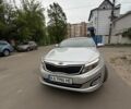 Серый Киа K5, объемом двигателя 2 л и пробегом 170 тыс. км за 9500 $, фото 1 на Automoto.ua