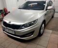 Серый Киа K5, объемом двигателя 2 л и пробегом 214 тыс. км за 8500 $, фото 1 на Automoto.ua