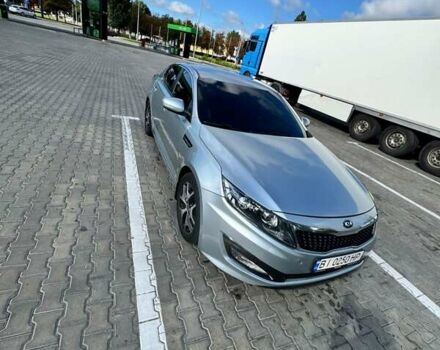 Серый Киа K5, объемом двигателя 2 л и пробегом 244 тыс. км за 7200 $, фото 24 на Automoto.ua