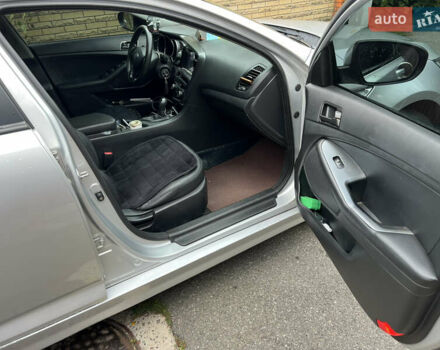 Серый Киа K5, объемом двигателя 2 л и пробегом 307 тыс. км за 8550 $, фото 10 на Automoto.ua