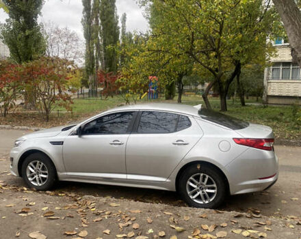 Серый Киа K5, объемом двигателя 2 л и пробегом 370 тыс. км за 8300 $, фото 6 на Automoto.ua