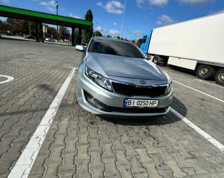 Серый Киа K5, объемом двигателя 2 л и пробегом 244 тыс. км за 7200 $, фото 23 на Automoto.ua