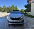 Серый Киа K5, объемом двигателя 2 л и пробегом 265 тыс. км за 10800 $, фото 1 на Automoto.ua