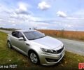 Серый Киа K5, объемом двигателя 2 л и пробегом 230 тыс. км за 12000 $, фото 5 на Automoto.ua