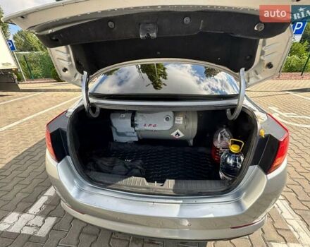 Серый Киа K5, объемом двигателя 2 л и пробегом 244 тыс. км за 7200 $, фото 31 на Automoto.ua