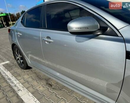 Серый Киа K5, объемом двигателя 2 л и пробегом 244 тыс. км за 7200 $, фото 25 на Automoto.ua
