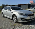Серый Киа K5, объемом двигателя 2 л и пробегом 240 тыс. км за 6999 $, фото 2 на Automoto.ua
