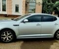 Серый Киа K5, объемом двигателя 2 л и пробегом 249 тыс. км за 8700 $, фото 7 на Automoto.ua