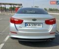 Серый Киа K5, объемом двигателя 2 л и пробегом 300 тыс. км за 8222 $, фото 3 на Automoto.ua
