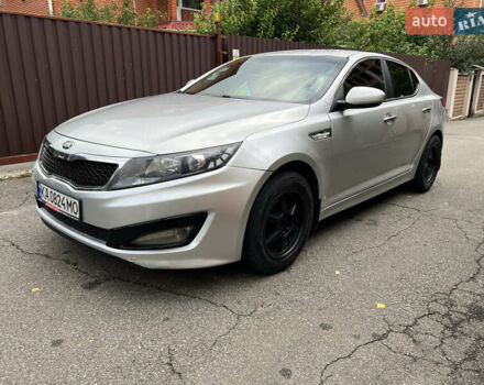 Серый Киа K5, объемом двигателя 2 л и пробегом 307 тыс. км за 8550 $, фото 3 на Automoto.ua
